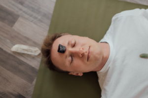 Man with Black Tourmaline Crystal on Forehead